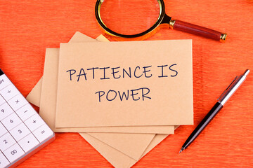 Business and patience is power concept. Copy space. PATIENCE IS POWER on postal envelopes in a...