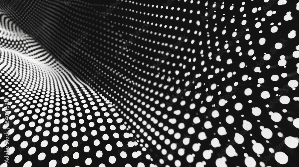 Poster a simple yet striking design featuring a repeating pattern of dots in black and white