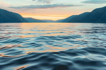 Tranquil mountain lake at sunset for wellness retreats with golden tones and peaceful ambiance
