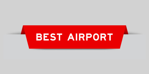 Red color inserted label with word best airport on gray background