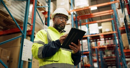 Warehouse, black man and manufacturing with tablet, inventory and checklist in a factory. African...