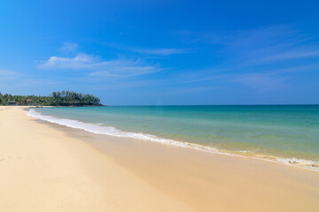 Beautiful wave on the beach, clear water, white sand in your holiday at andaman sea Phuket Thailand.