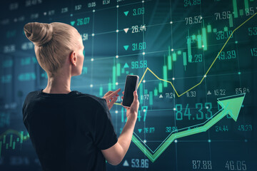 Attractive young european woman using smartphone with growing green forex chart and arrows on...