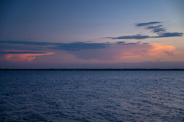 Obraz premium sunset on the river