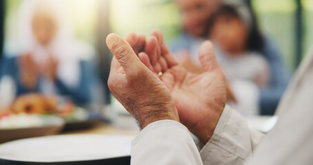 Hands, praying and Muslim family with food to say prayer or dua before Eid dinner on holy month of...