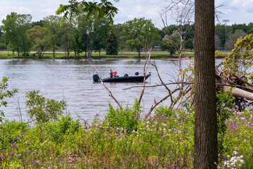 Boat With Fishermen On Fox River Near De Pere, Wisconsin