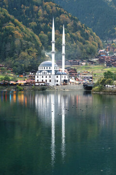 Uzungol Mosque reflected in the lake, Trabzon, Turkey Minor