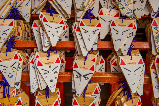Wooden souvenir plaques at the Endless Red Gates of Kyoto's Fushimi Inari, Kyoto, Honshu
