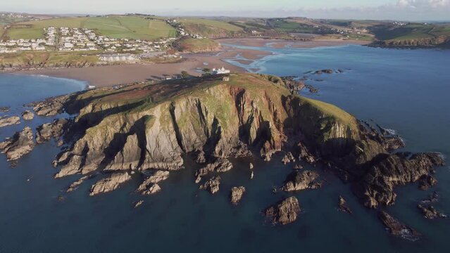 A drone view flying across Burgh Island, the beach at Bigbury and towards the estuary of the River Avon, at low tide, south coast of Devon, southwest England, United Kingdom, Europe