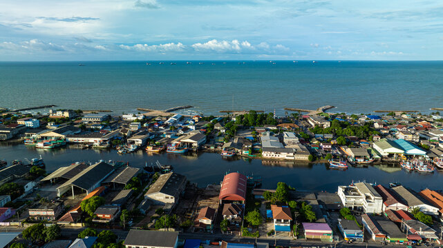 Aerial view fishery village wooden boat on sea bay