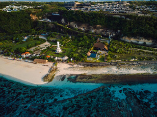 Most famous Pandawa beach with scenic lighthouse and ocean in Bali.