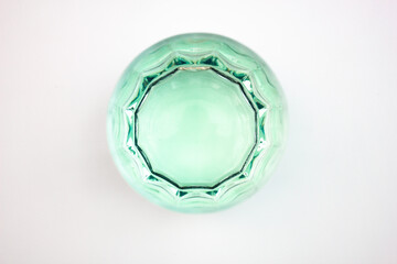 Glass glass glass with turquoise,light green, drink. Alcoholic drink on isolated background, top...
