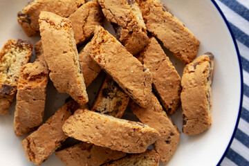 Chocolate Cantuccini on a Plate, top view. Flat lay, overhead, from above.