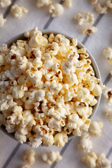 White Buttered Popcorn with Salt in a Bowl, top view.