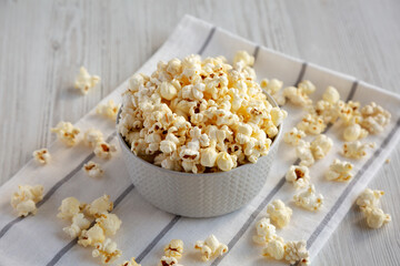 White Buttered Popcorn with Salt in a Bowl, side view.