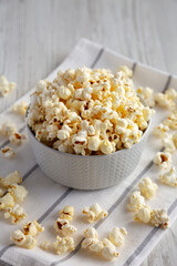 White Buttered Popcorn with Salt in a Bowl, side view.