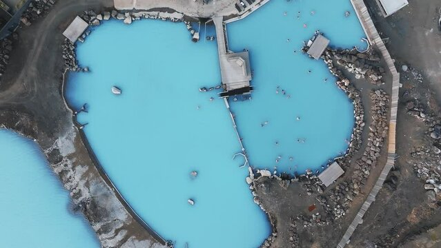 Aerial view of the Blue lagoon in Iceland. The most famous and popular SPA place in Iceland. Landscape from air. Vacation image. Blue and hot water in geothermal lake.