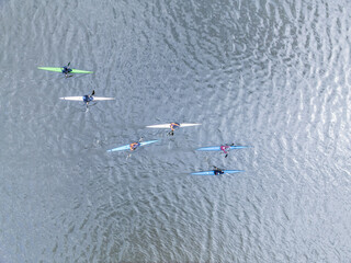 Kayaking top view. Group of kayaks rowing. Aerial view from drone. © Dmitrii Potashkin