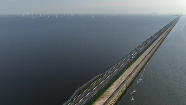 Long Road in the Sea. Afsluitdijk construction on pumping stations, new sluices and A7 Highway in Northern Netherlands. 