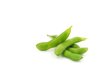 Fresh edamame soybeans and pods isolated on white background.