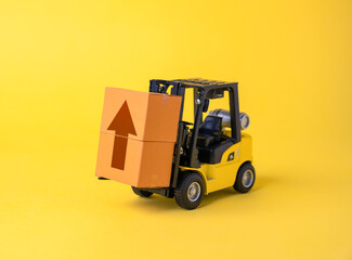 Forklift with boxes and up arrow. Logistics and product distribution. Increase in freight traffic....