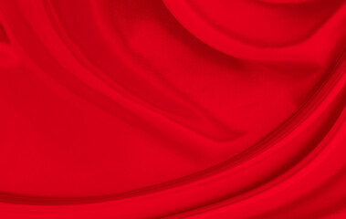 Black red satin dark fabric texture luxurious shiny that is abstract silk cloth background with patterns soft waves blur beautiful.