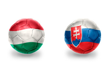 football balls with national flags of slovakia and hungary ,soccer teams. on the white background.