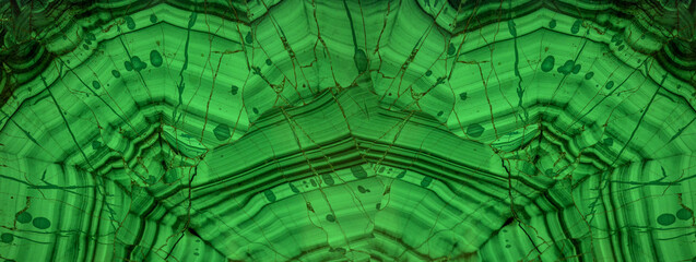 Malachite is a green mineral gemstone texture. Semiprecious ornamental stone malachite. green background, banner