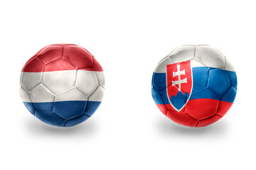 Fototapeta premium football balls with national flags of slovakia and netherlands ,soccer teams. on the white background.