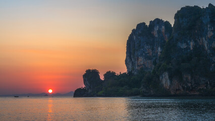 sunset at tonsai beach on tropical island railay in krabi in thailand