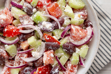 Homemade Chopped Mediterranean Salad in a Bowl, top view.
