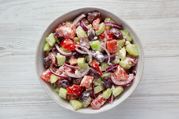 Homemade Chopped Mediterranean Salad in a Bowl, top view. Flat lay, overhead, from above.