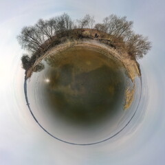 Obraz premium Panoramic view from drone, small planet and blue sky around the globe