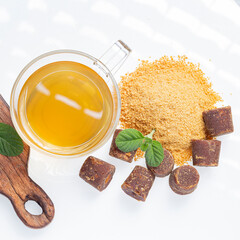Piloncillo, ground piloncillo and piloncillo tea isolated
