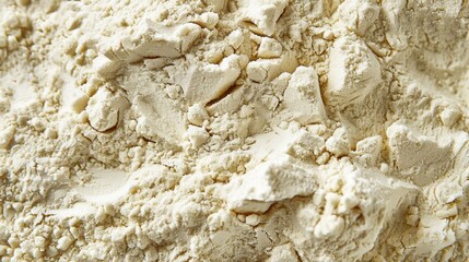 This flour is agglutinated with rough co grains clumped together to form a dense and chunky texture