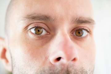 Male Brown Eyes close-up, young Caucasian man looking, Masculine beauty, vision examination, myopia, eye fatigue, color perception