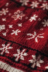 Cozy winter accessory featuring intricate snowflake design on a red knitted sweater