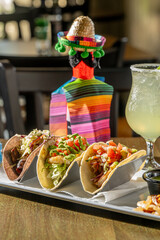 A Trio of Tasty Tacos - Suadero (braised brisket on blue corn tortilla), Grouper and Shrimp tacos...
