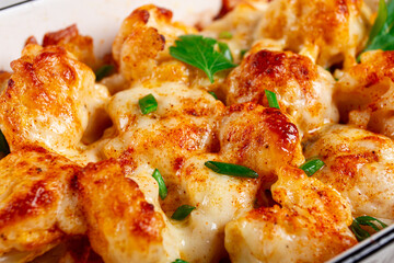 baked cauliflower, in cream sauce, with cheese and spices, homemade, no people,