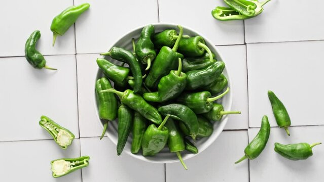 Fresh green Spanish Pimientos de Padron pepper or jalapeno, green bell pepper, stock video footage 4k
