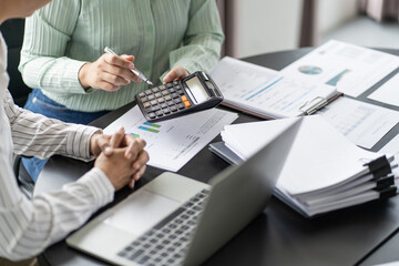 Auditor or internal revenue service staff, Business women checking annual financial statements of...