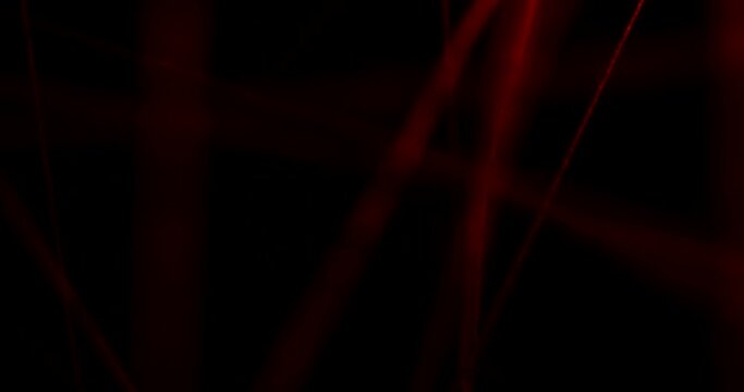 Stretched red threads on a black background in volumetric space. Psychology and psychiatry. Visualization of phobias and their removal. Camera movement and shifting focus from blur
