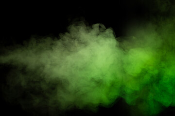 Green and white steam on a black background.