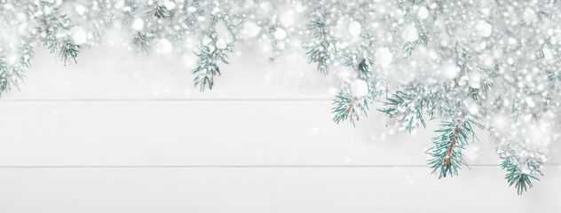 Christmas garland lights, holiday festive winter art design. Widescreen backdrop. Snowy scene.