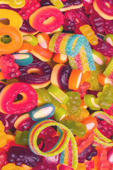 Assorted colorful gummy candies. Top view. Jelly donuts.