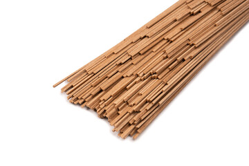Buckwheat noodles isolated on a white background.