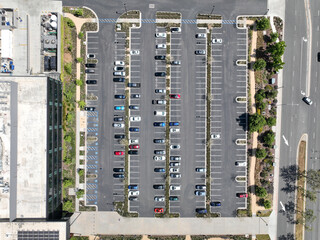 Open car parking lot viewed from above, aerial top view