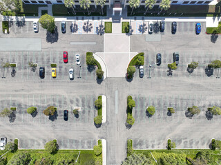 Open car parking lot viewed from above, aerial top view