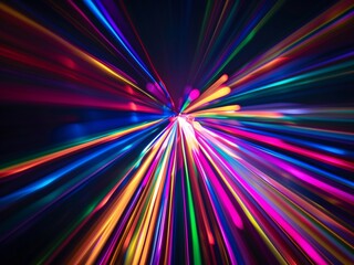 Fototapeta premium Vibrant, multicolored light streaks radiate from a central point against a dark background, creating a dynamic and energetic visual effect
