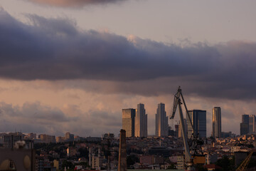 Naklejka premium Southern cityscape, evening view of buildings and houses in public places in Turkey, in the city of Istanbul